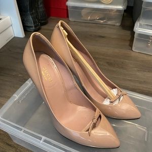 Gucci Tan/Beige color 4' high heel pump. Size 5